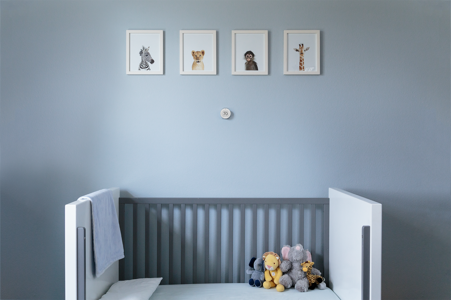 Puck 2 on nursery wall above crib